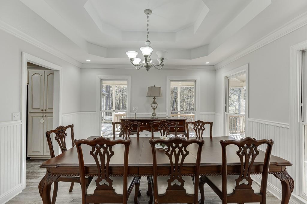 6360 Nix Road Dawsonville, GA 30534 - Photo 18 of 58 a view of a dining room with furniture and window