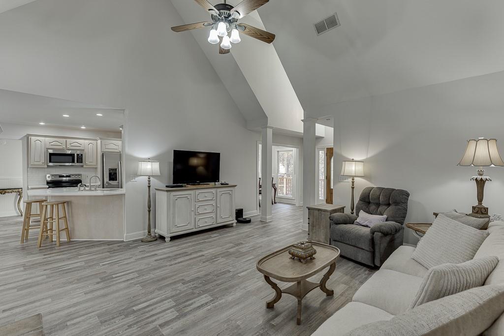 6360 Nix Road Dawsonville, GA 30534 - Photo 23 of 58 a living room with furniture and a flat screen tv
