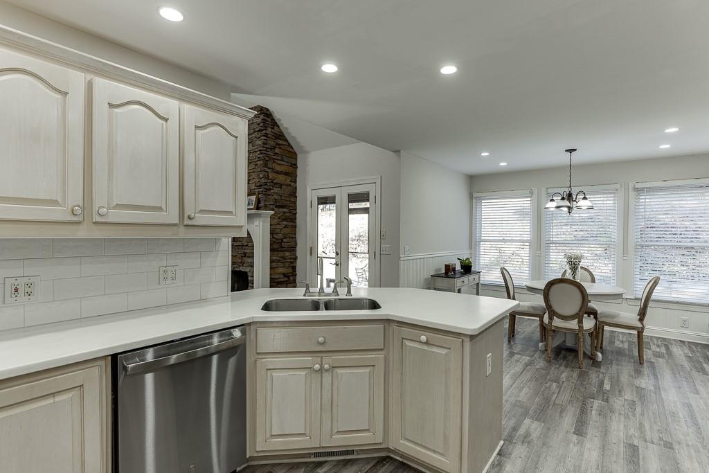 6360 Nix Road Dawsonville, GA 30534 - Photo 28 of 58 a kitchen with stainless steel appliances granite countertop a sink and cabinets