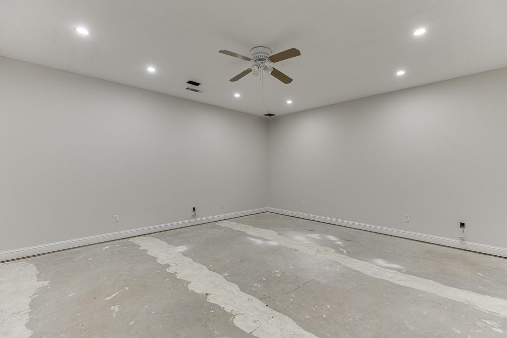 6360 Nix Road Dawsonville, GA 30534 - Photo 50 of 58 an empty room with a ceiling fan and window