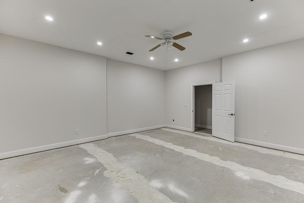 6360 Nix Road Dawsonville, GA 30534 - Photo 51 of 58 an empty room with a ceiling fan and window