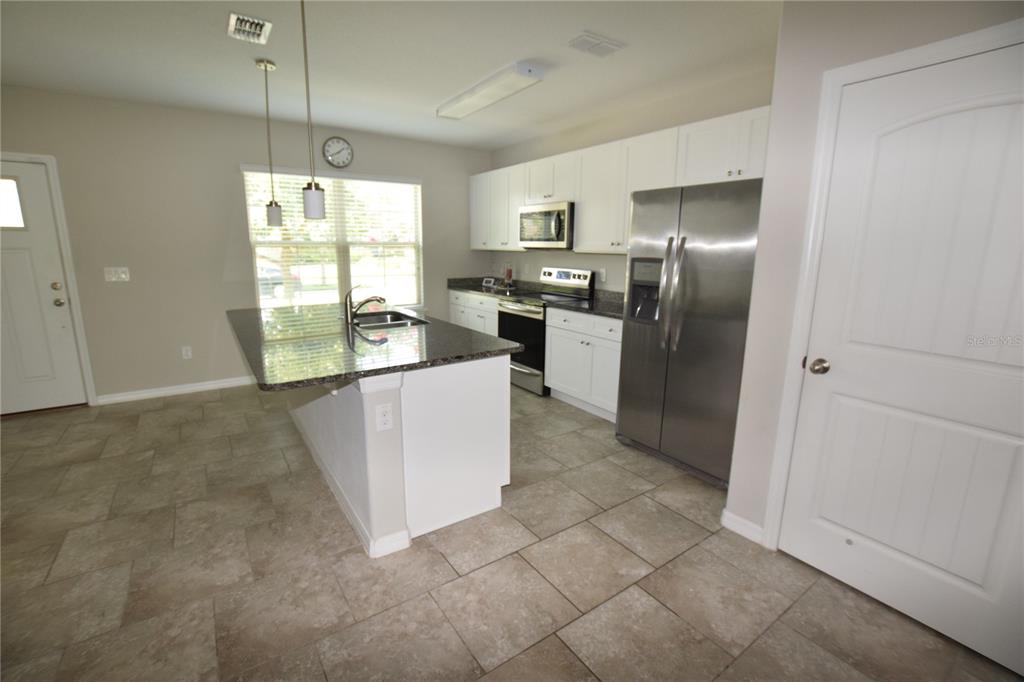 16097 Pebble Bluff Loop Winter Garden, FL 34787 - Photo 9 of 32