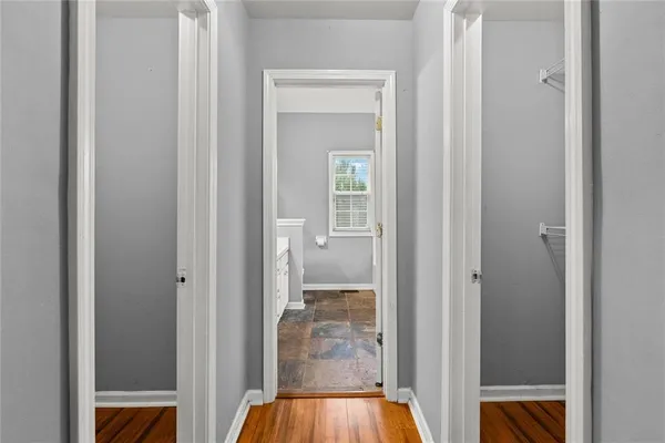 a view of a bedroom from a hallway