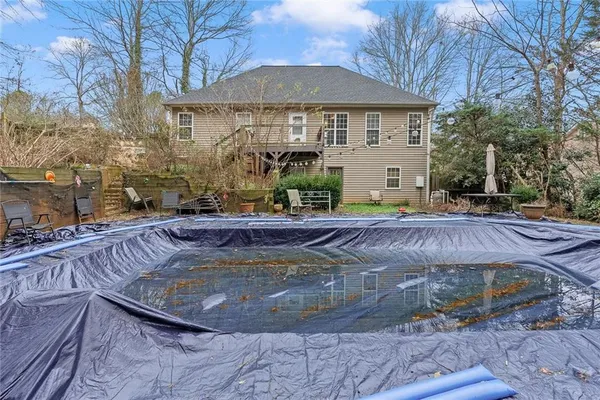 a view of a house with swimming pool
