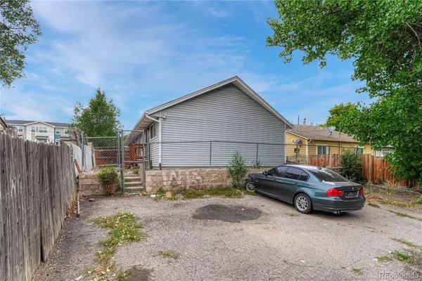 a car parked in front of a house