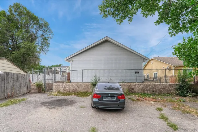 a car parked in front of a house