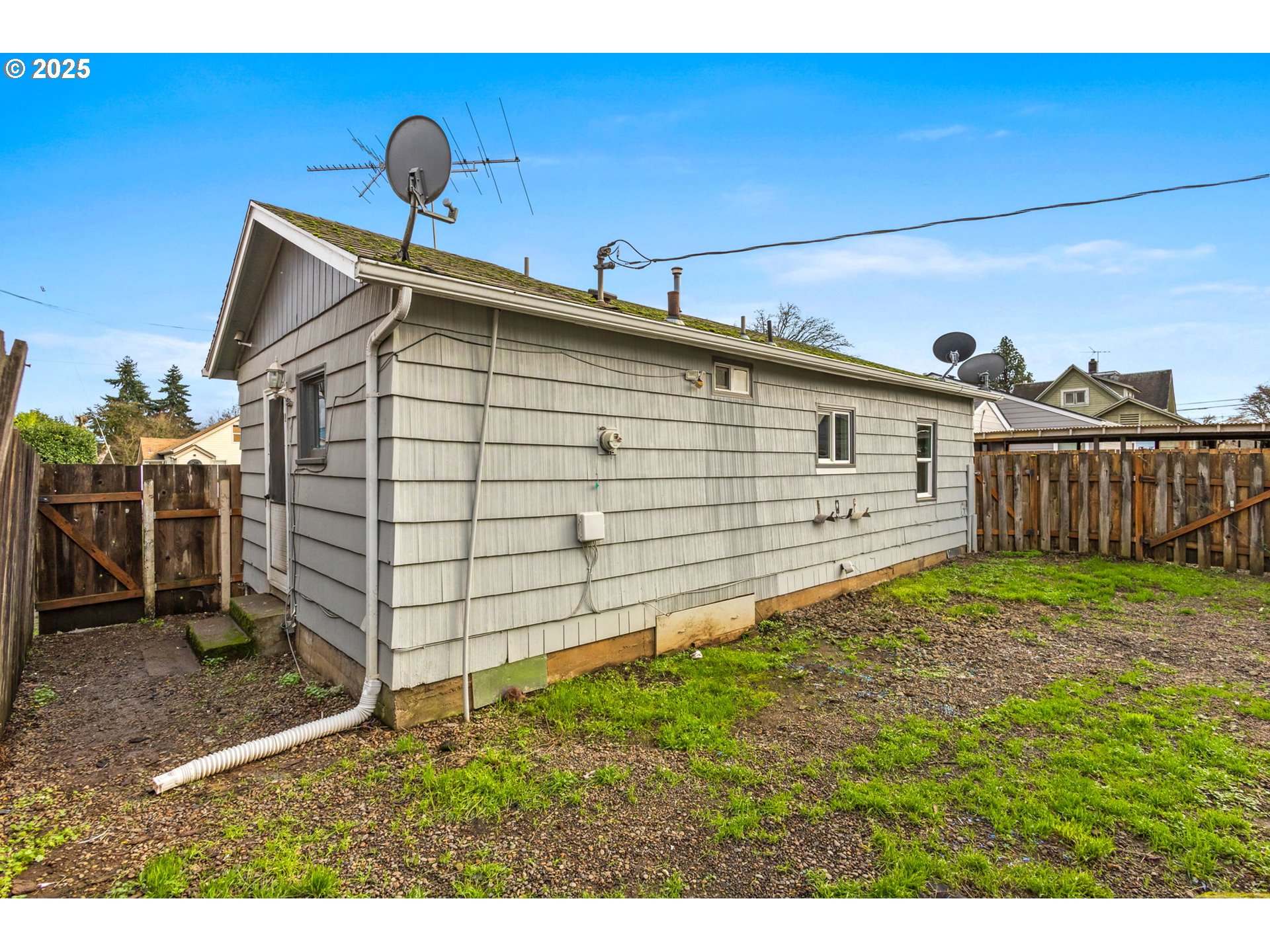 1141 Southeast Lewis Street Dallas, OR 97338 - Photo 18 of 20 a view of a backyard with wooden fence