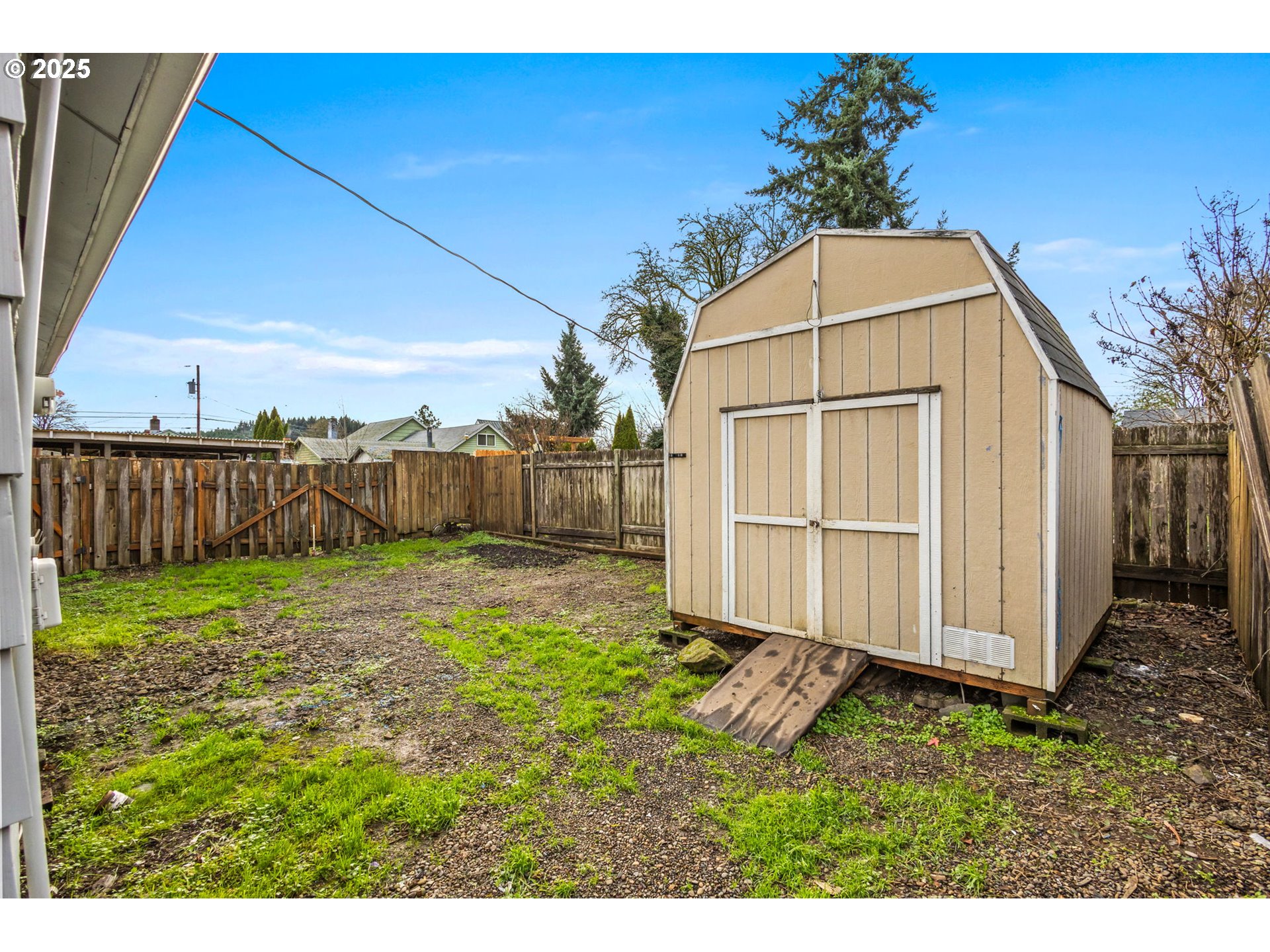 1141 Southeast Lewis Street Dallas, OR 97338 - Photo 19 of 20 a backyard of a house with lots of green space
