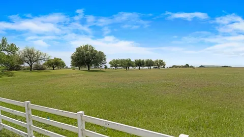 a view of outside space with a lake view