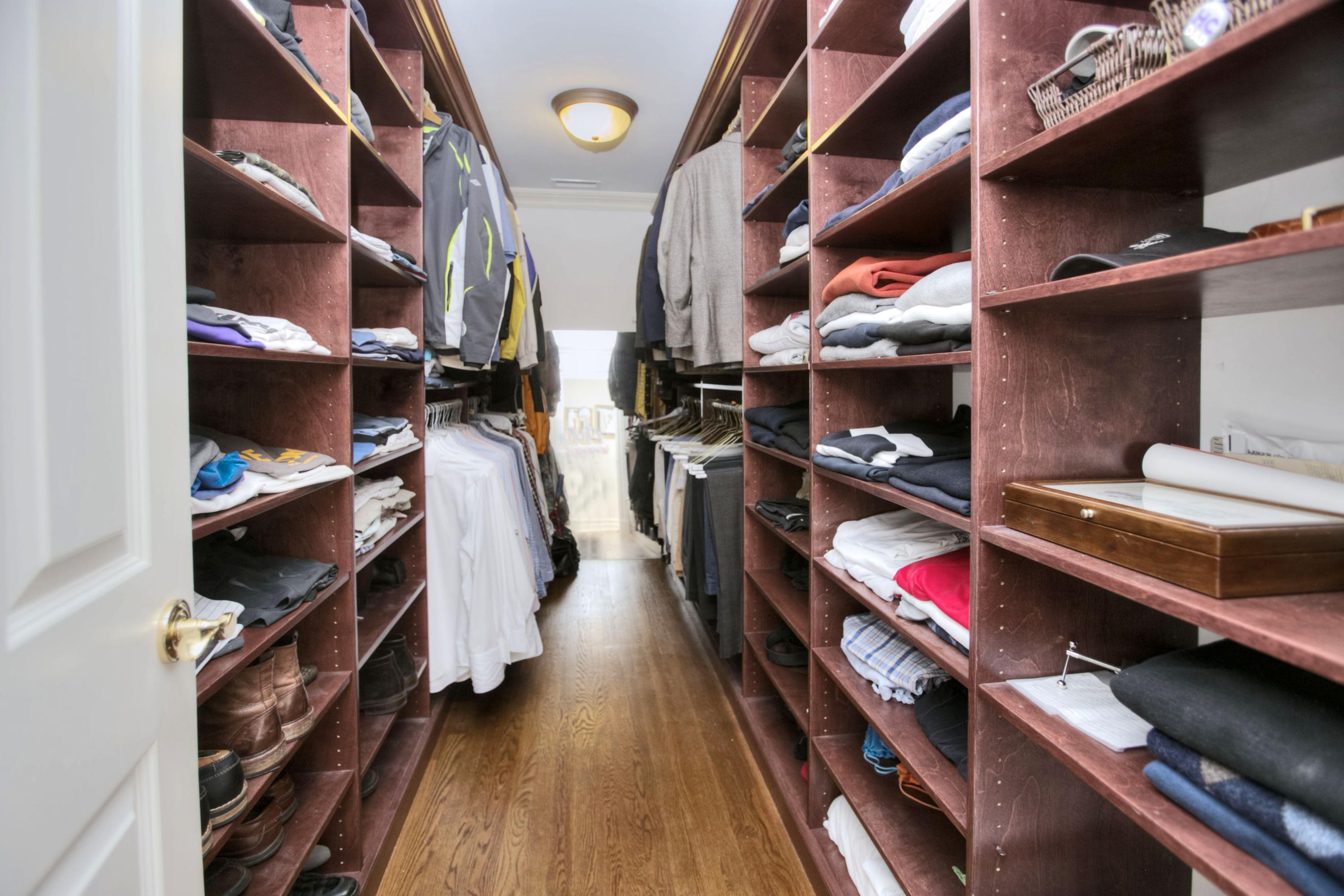 124 Thayer Pond Road New Canaan, CT 06840 - Photo 18 of 34 His closet