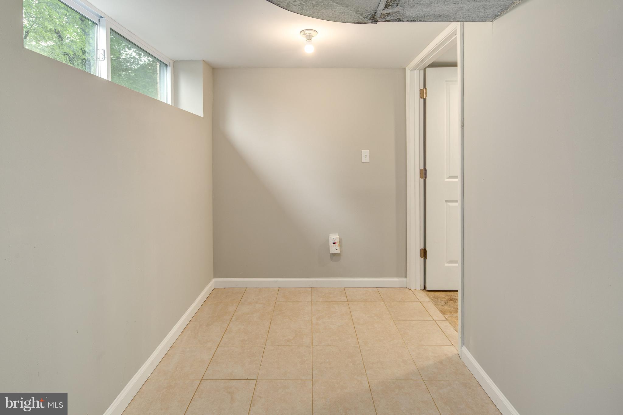 12908 Gaffney Road Silver Spring, MD 20904 - Photo 27 of 29 Finished Storage Area