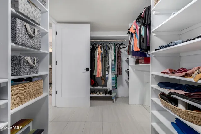 a bathroom with a shower and toilet