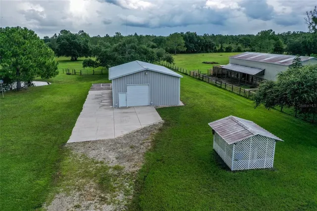 a view of a garden with an outdoor space and seating