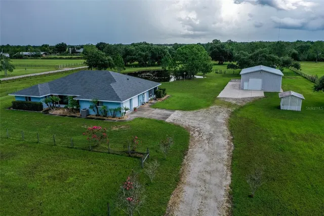 a aerial view of a house with garden