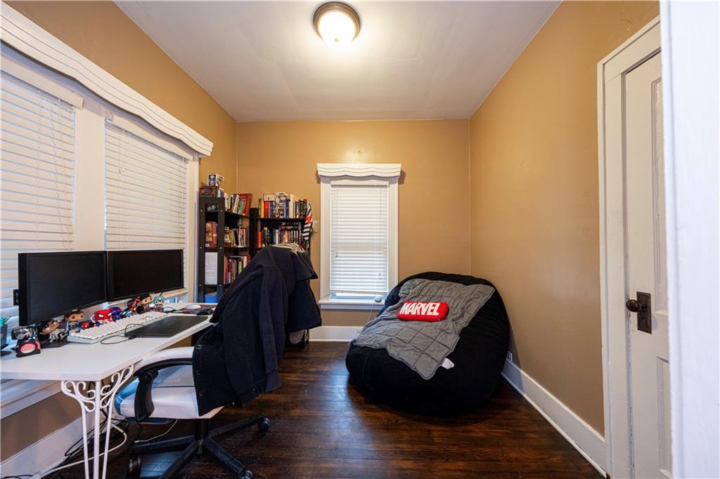 4263 Evergreen Road Pittsburgh, PA 15214 - Photo 8 of 28 a room with furniture and a flat screen tv