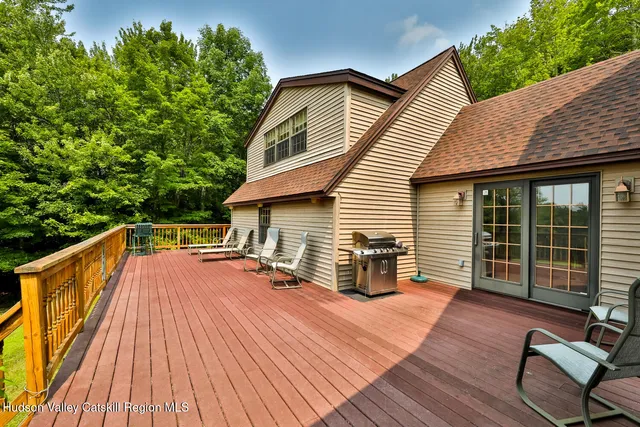 a view of house with pool deck