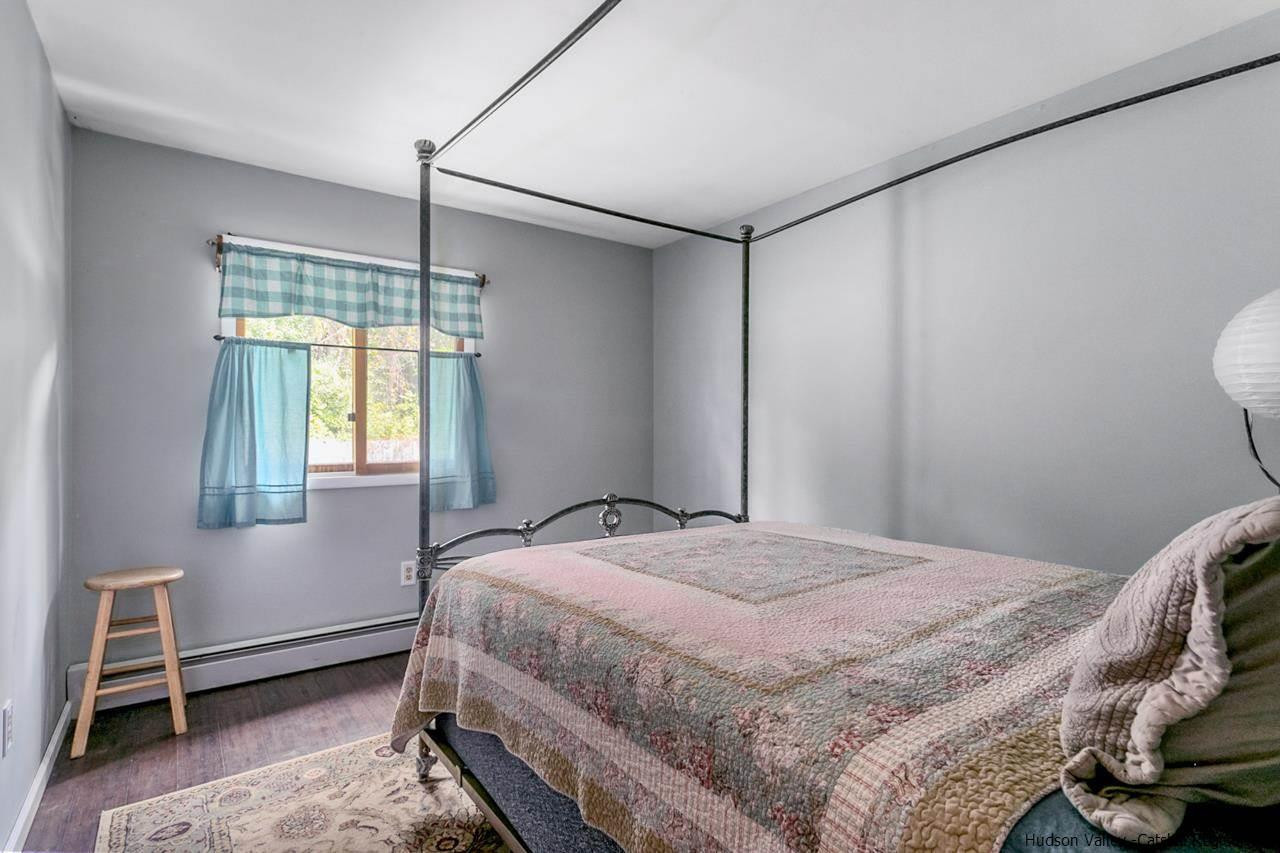 665 Scotchtown Collabar Road Middletown, NY 10941 - Photo 11 of 22 a bedroom with a bed and a window