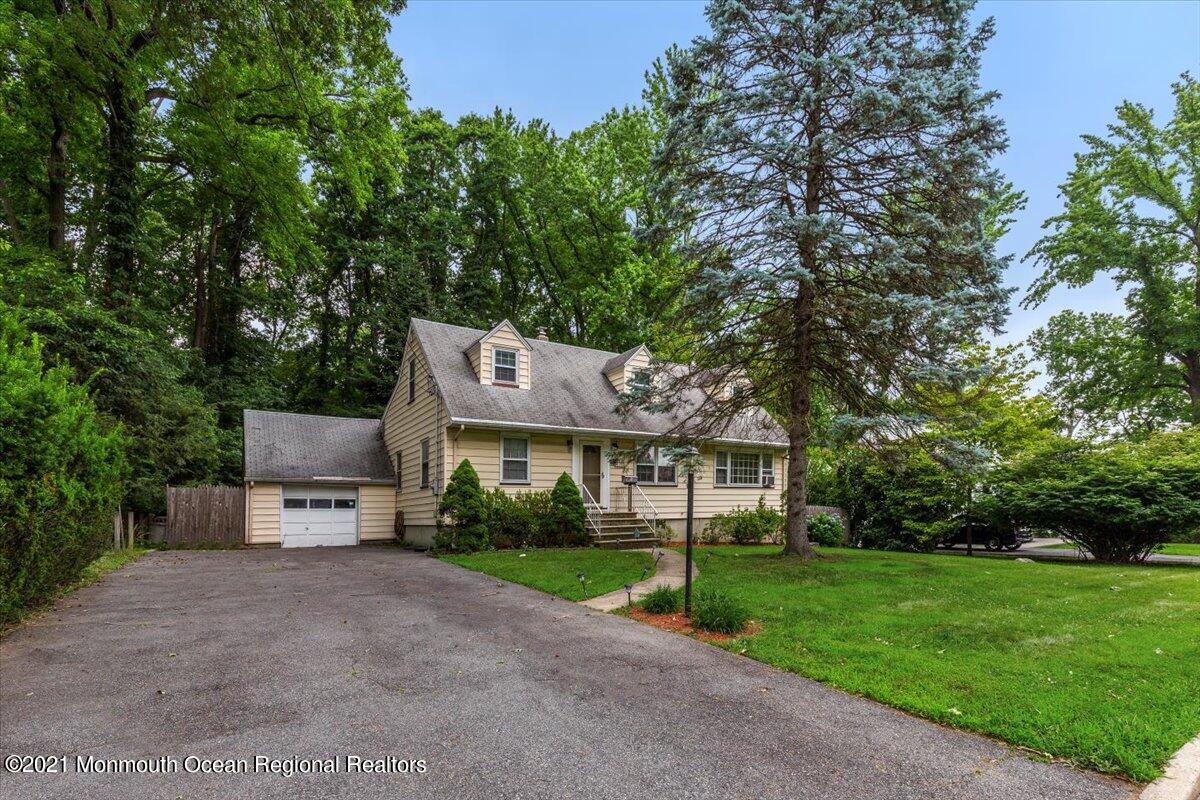 14 Hilltop Terrace Wayne, NJ 07470 - Photo 2 of 34 a aerial view of a house with a yard and large trees