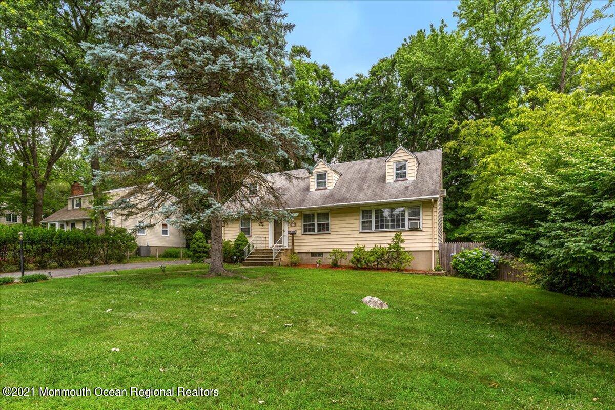 14 Hilltop Terrace Wayne, NJ 07470 - Photo 3 of 34 a front view of house with yard and green space