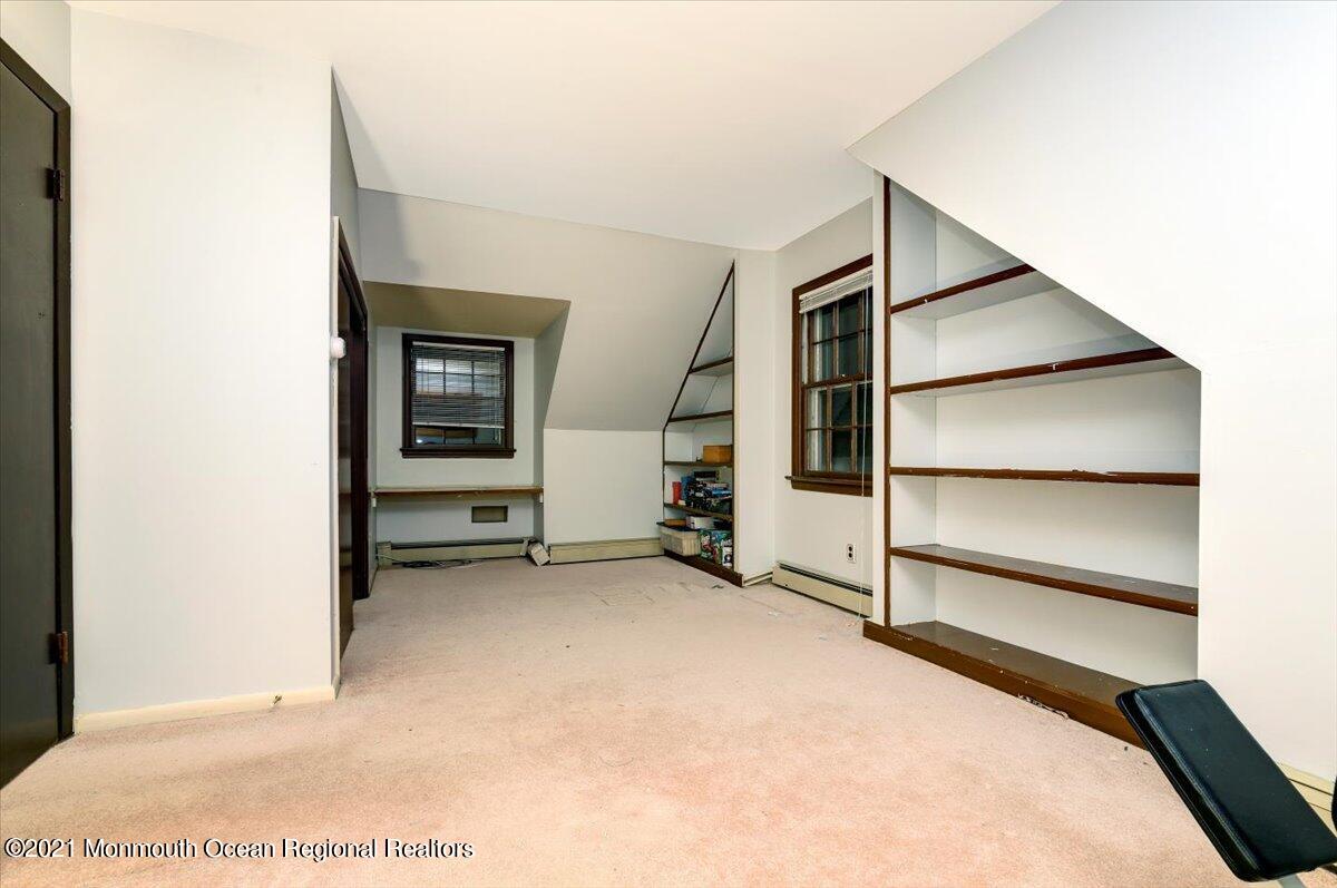 14 Hilltop Terrace Wayne, NJ 07470 - Photo 33 of 34 a view of an empty room with cabinet and a window
