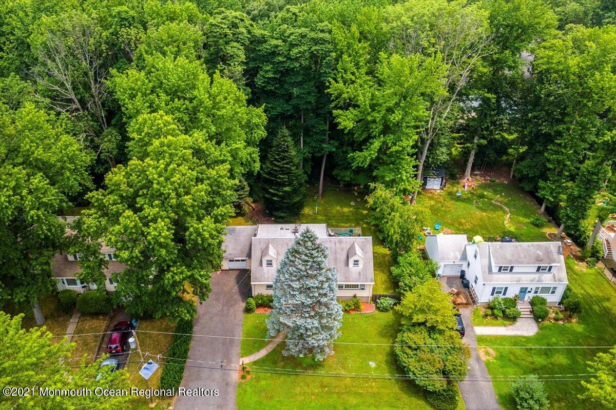 14 Hilltop Terrace Wayne, NJ 07470 - Photo 6 of 34 an aerial view of residential house with outdoor space and trees all around