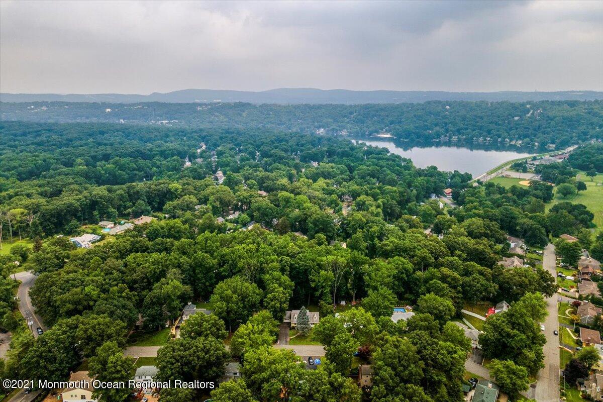 14 Hilltop Terrace Wayne, NJ 07470 - Photo 8 of 34 an aerial view of residential houses with outdoor space and trees