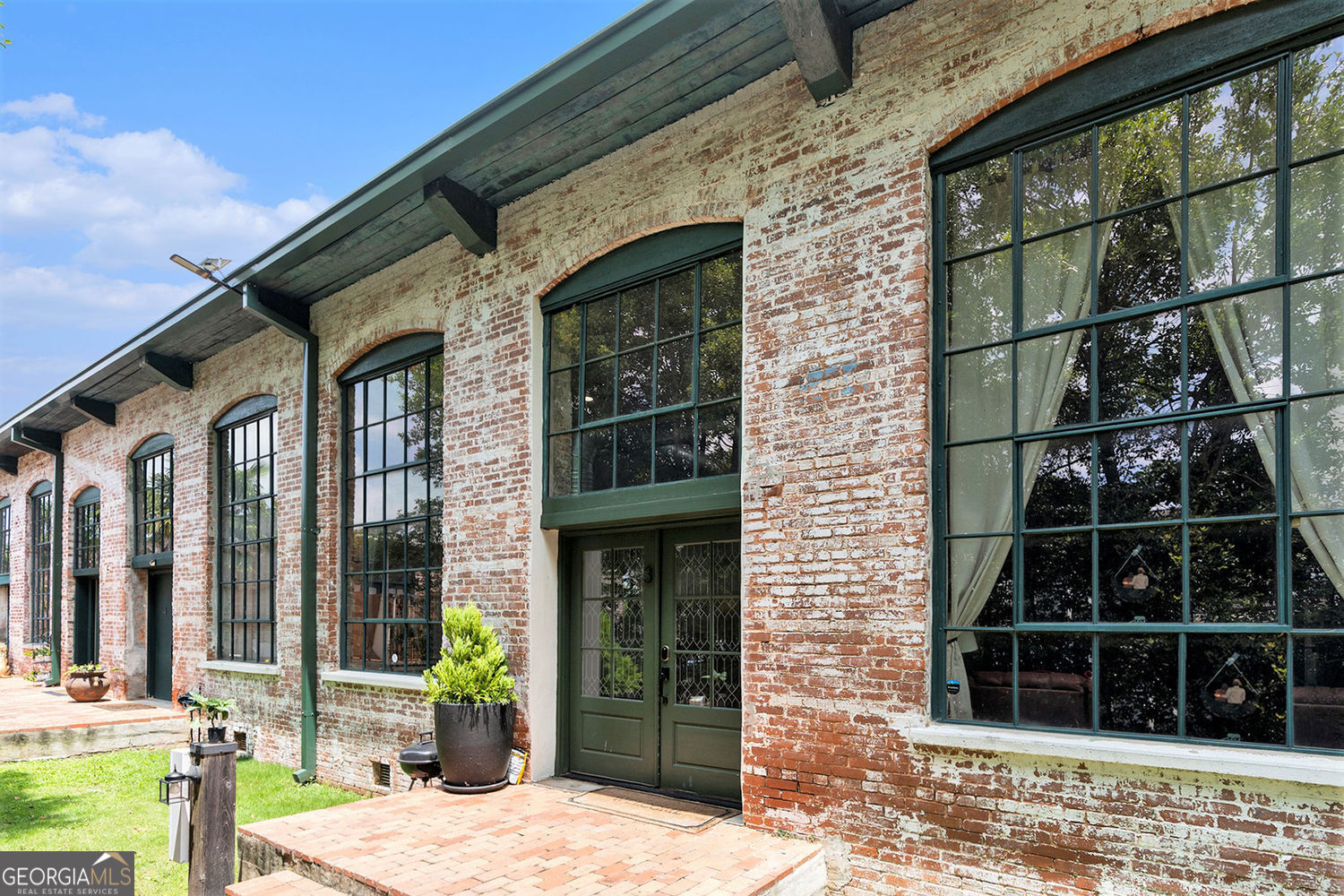 10 James Street, Unit 3 Hampton, GA 30228 - Photo 1 of 1 a view of a entryway door front of house