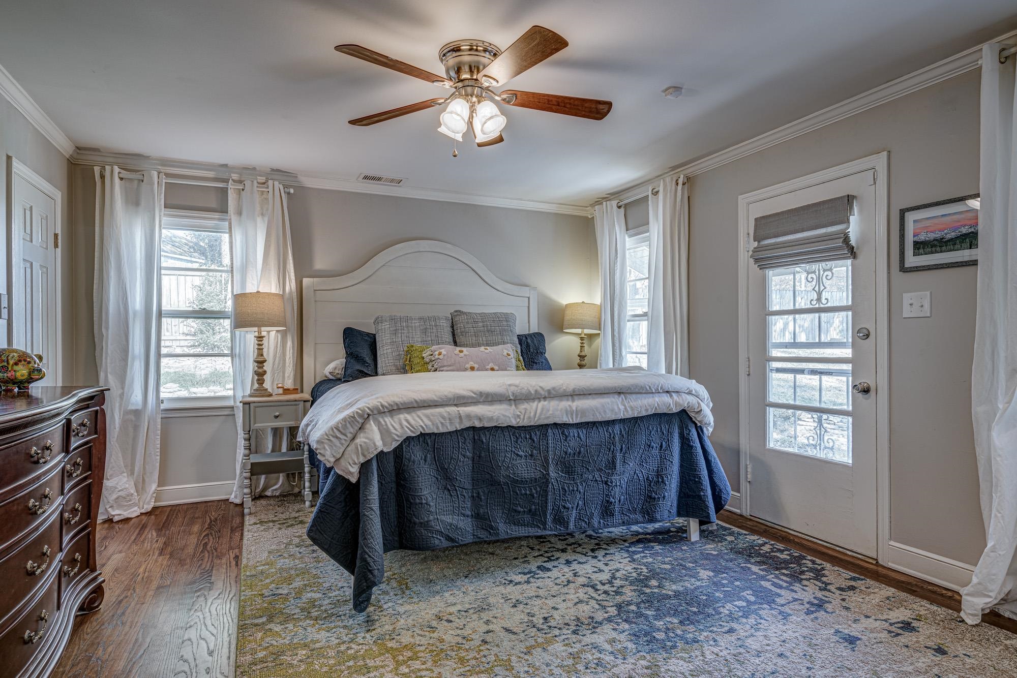 5362 Sea Isle Road Memphis, TN 38119 - Photo 12 of 21 a bed sitting in a spacious bedroom next to a window