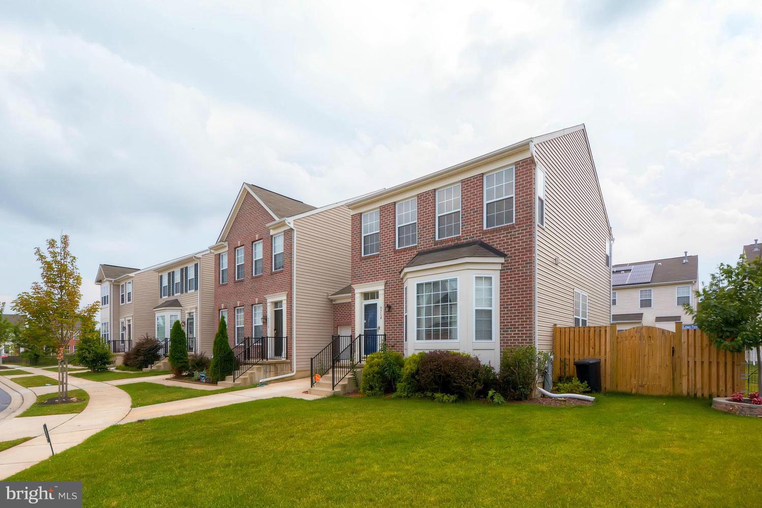 9714 Langley Road Baltimore, MD 21220 - Photo 2 of 27 a front view of a house with a yard