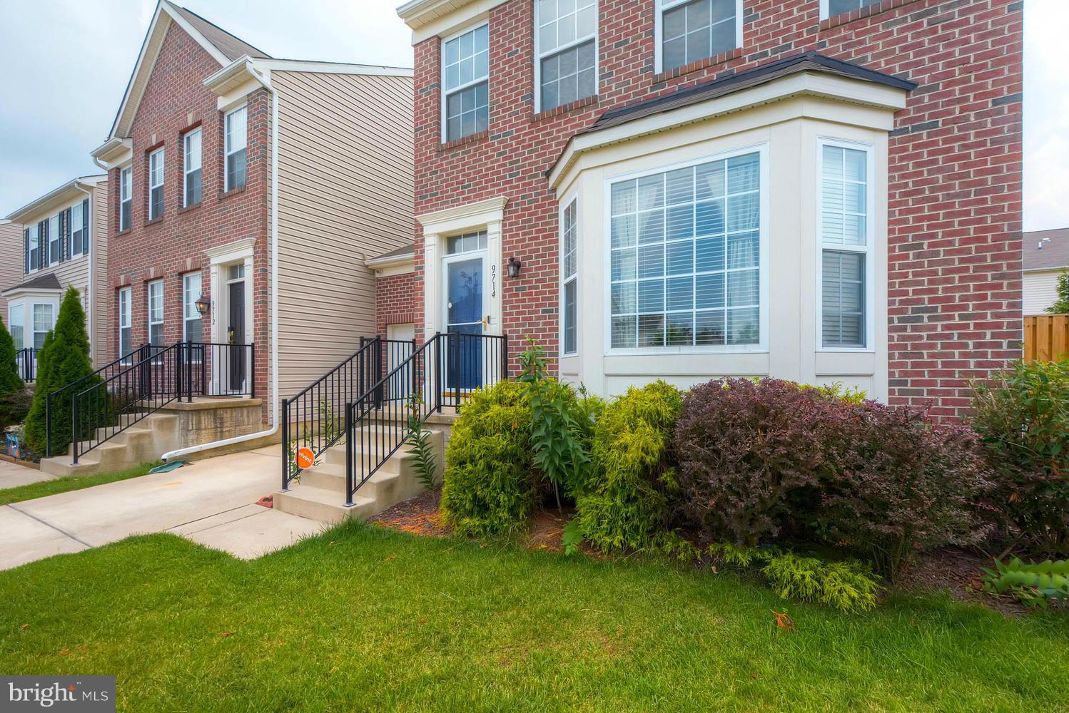 9714 Langley Road Baltimore, MD 21220 - Photo 3 of 27 a view of a building with a yard