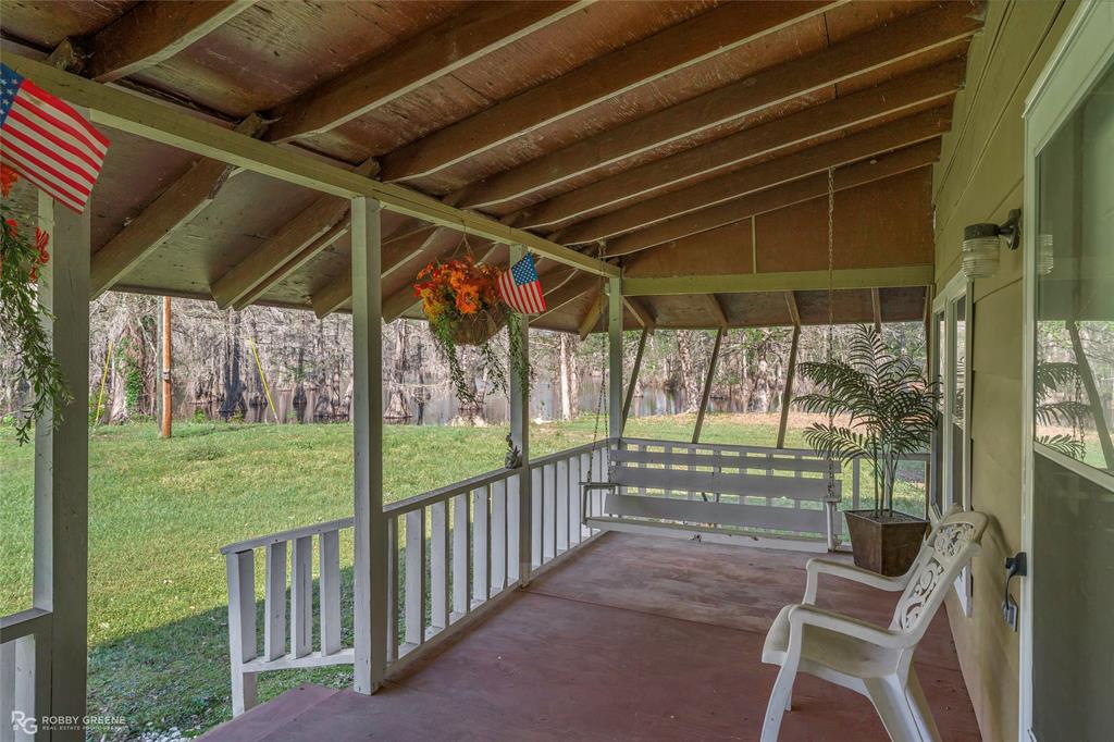 121 Willow Street Heflin, LA 71039 - Photo 10 of 39 a view of a porch