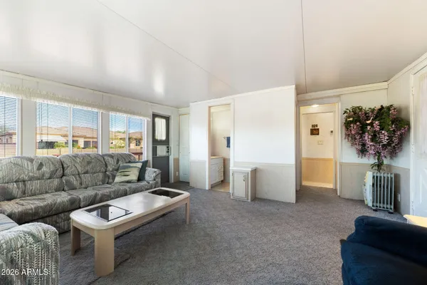 a living room with furniture and a couch