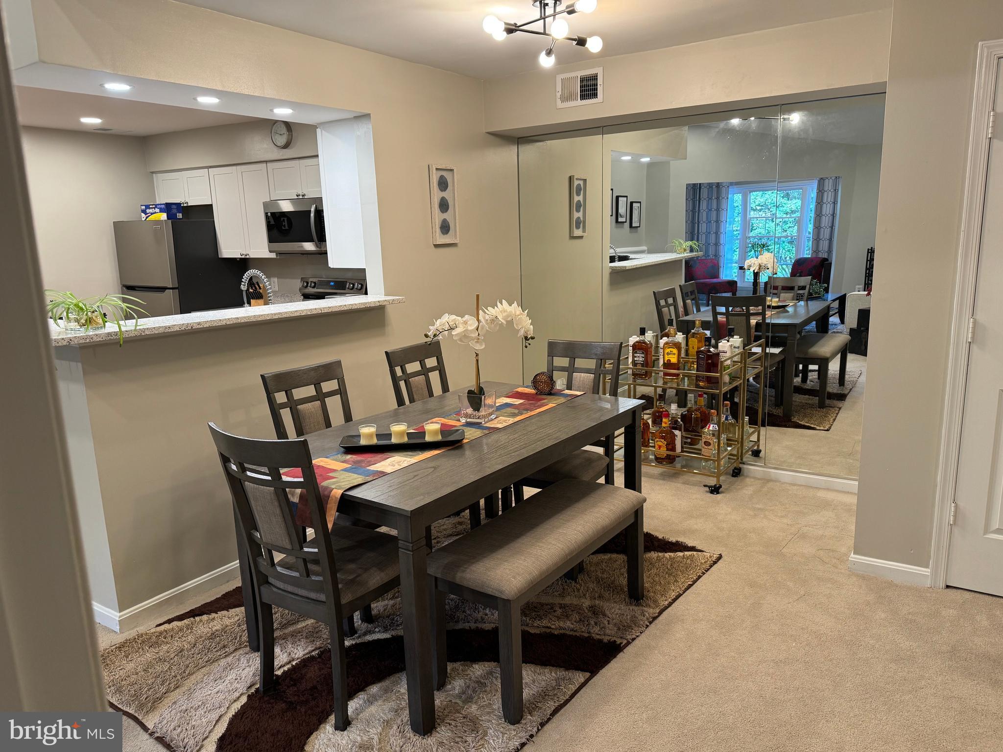 11709 Karbon Hill Court, Unit I Reston, VA 20191 - Photo 14 of 38 a view of a dining room with furniture