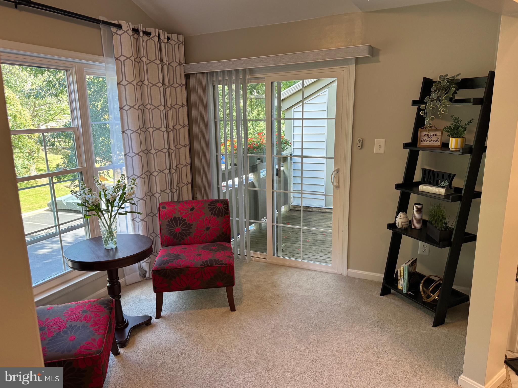 11709 Karbon Hill Court, Unit I Reston, VA 20191 - Photo 16 of 38 a living room with furniture and a window