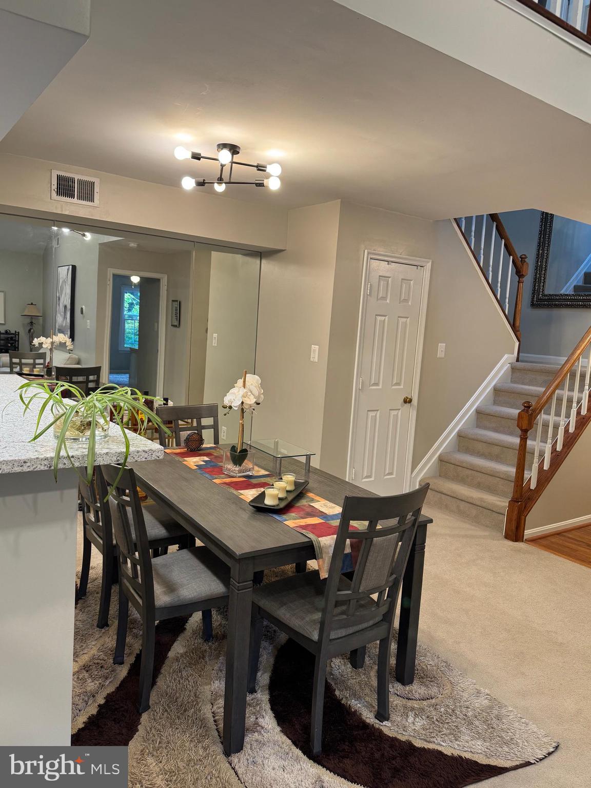 11709 Karbon Hill Court, Unit I Reston, VA 20191 - Photo 17 of 38 a view of a dining room with furniture