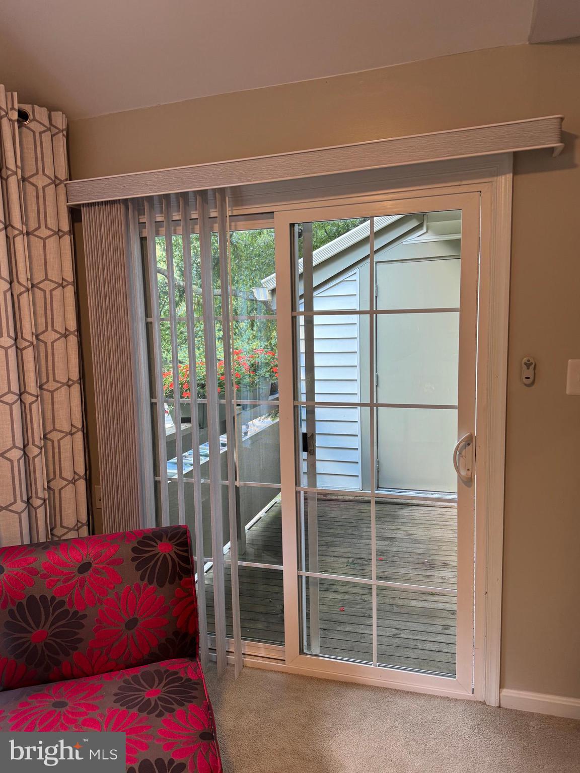 11709 Karbon Hill Court, Unit I Reston, VA 20191 - Photo 22 of 38 a living room with a couch and a large window