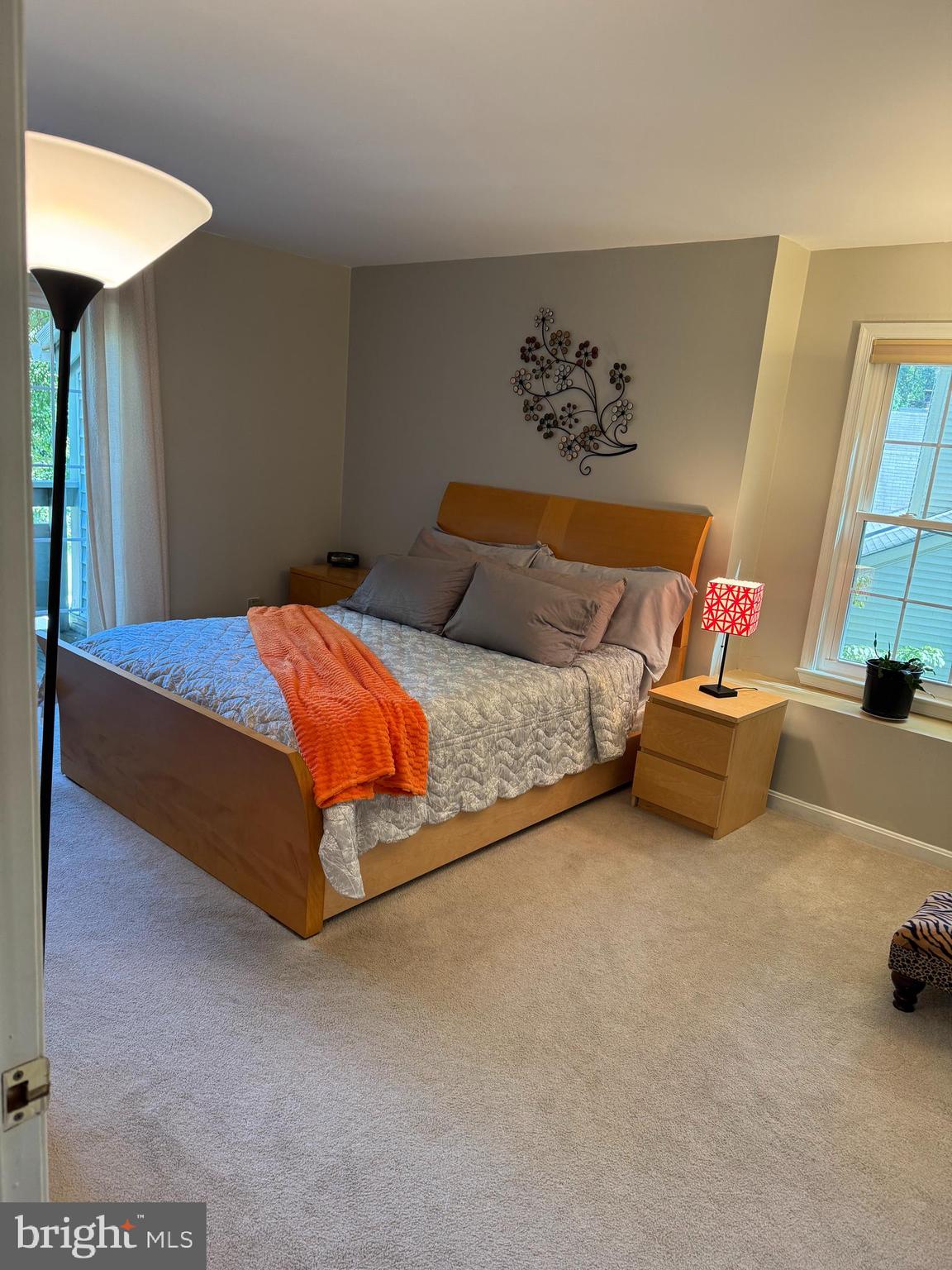 11709 Karbon Hill Court, Unit I Reston, VA 20191 - Photo 25 of 38 a bedroom with a bed and a couch