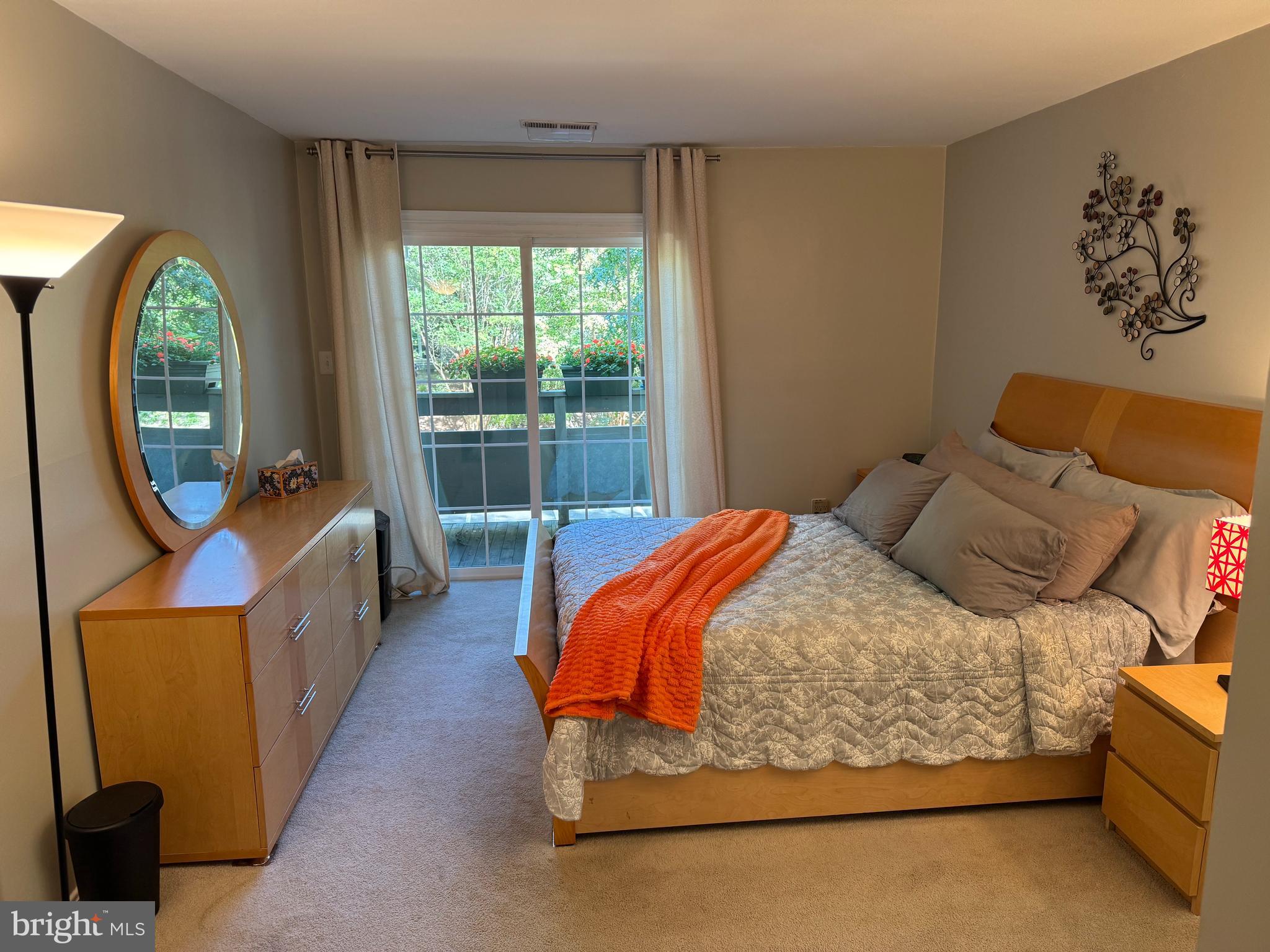 11709 Karbon Hill Court, Unit I Reston, VA 20191 - Photo 26 of 38 a bedroom with bed and balcony