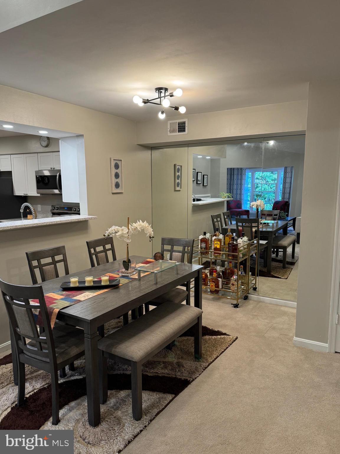 11709 Karbon Hill Court, Unit I Reston, VA 20191 - Photo 6 of 38 a view of a dining room with furniture