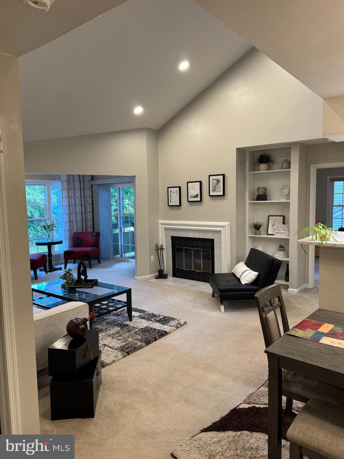 11709 Karbon Hill Court, Unit I Reston, VA 20191 - Photo 7 of 38 a living room with furniture and a fireplace