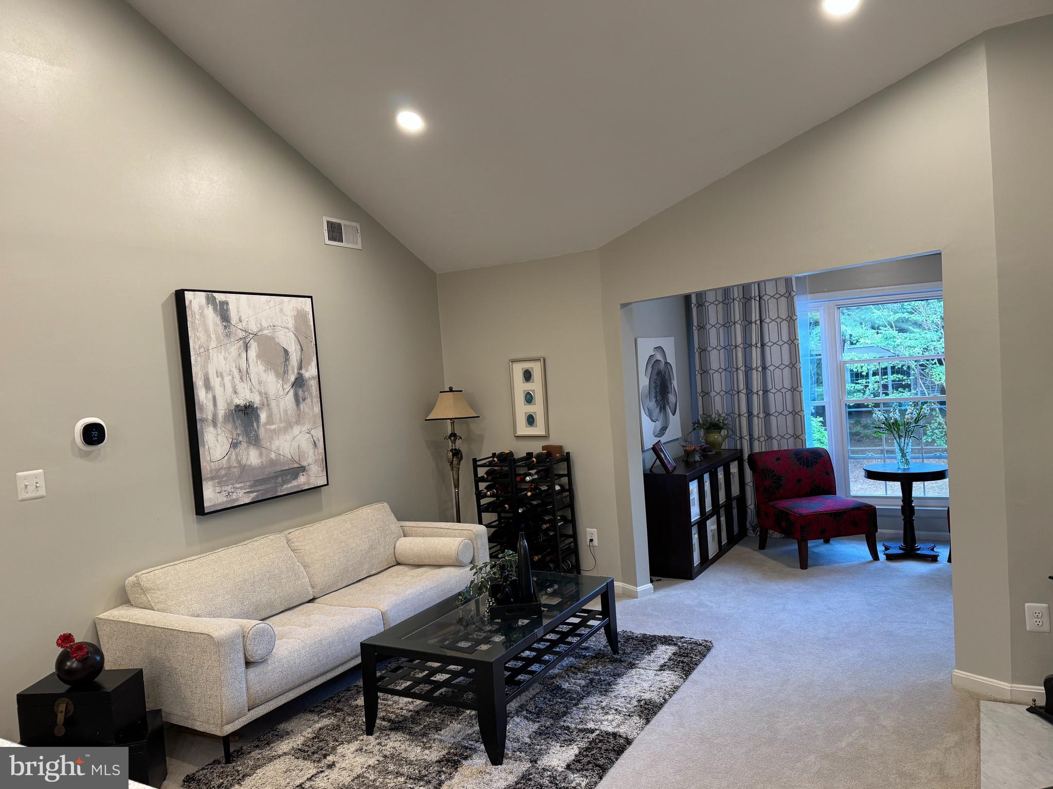 11709 Karbon Hill Court, Unit I Reston, VA 20191 - Photo 8 of 38 a living room with furniture and a window