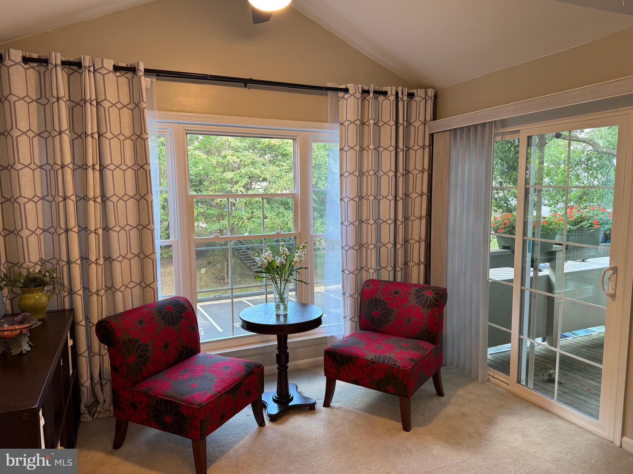 11709 Karbon Hill Court, Unit I Reston, VA 20191 - Photo 10 of 38 a living room with furniture and a large window