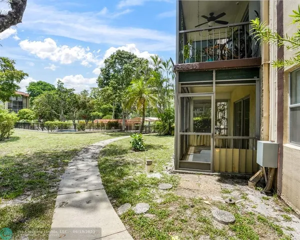 a view of a garden with pathway