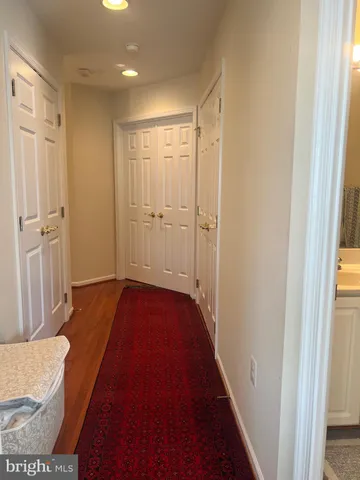 a view of a bathroom from the hallway