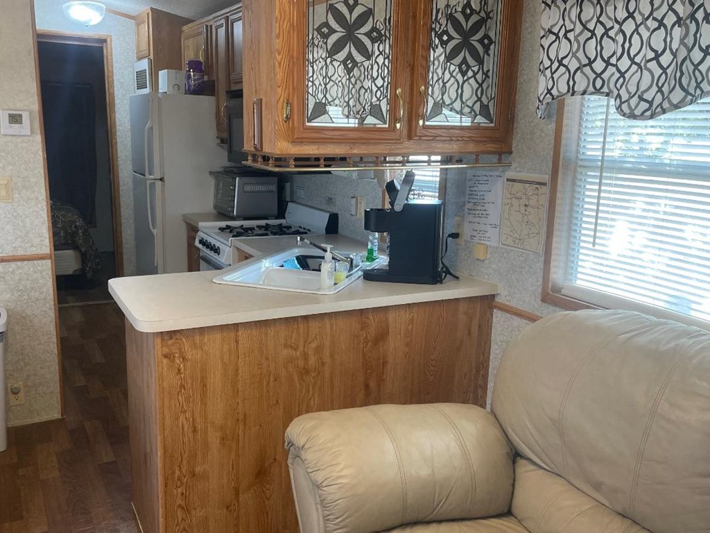 19831 West Rr 337 Camp Camp Wood, TX 78833 - Photo 15 of 27 a bathroom with a sink toilet and mirror