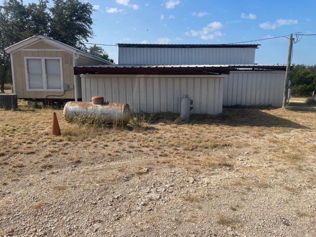 19831 West Rr 337 Camp Camp Wood, TX 78833 - Photo 24 of 27 a backyard of a house