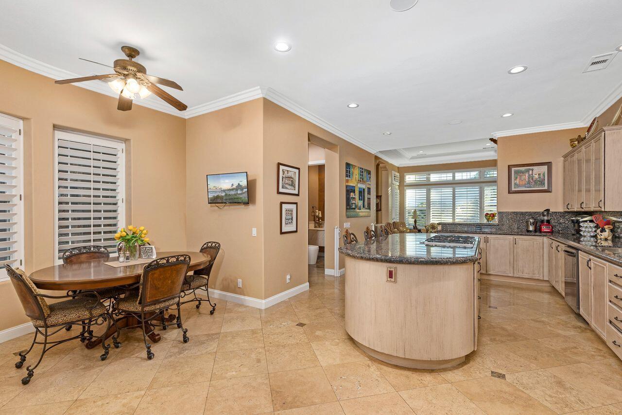 20 Vista Encantada Rancho Mirage, CA 92270 - Photo 13 of 37 a view of a dining room with furniture and chandelier