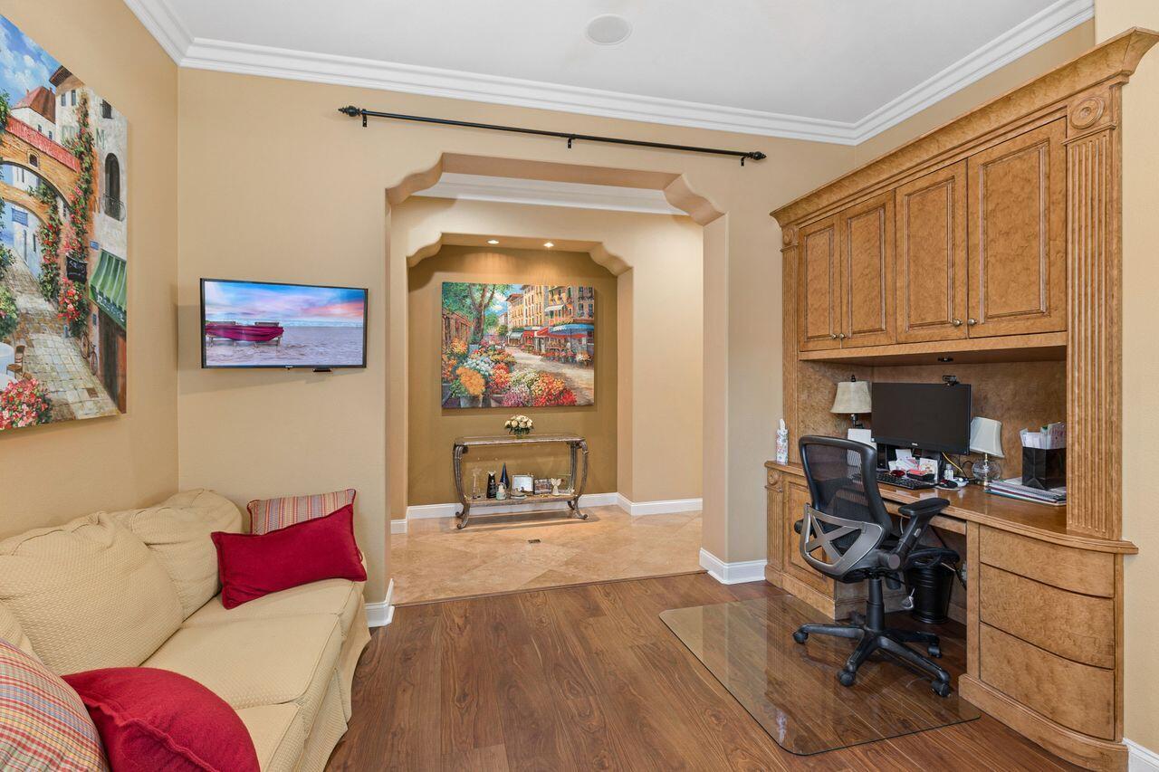 20 Vista Encantada Rancho Mirage, CA 92270 - Photo 15 of 37 a living room with furniture and a flat screen tv