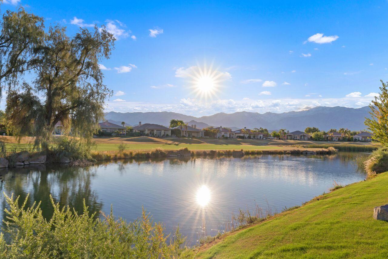 20 Vista Encantada Rancho Mirage, CA 92270 - Photo 28 of 37 a view of a lake with a city