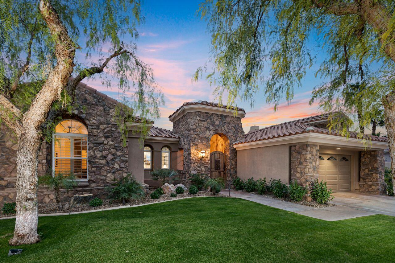 20 Vista Encantada Rancho Mirage, CA 92270 - Photo 30 of 37 front view of a house with a garden